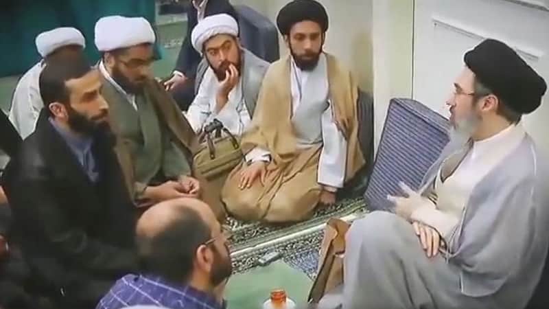 A scene showing Iran's Supreme Leader Mojtaba Khamenei conversing with a few people.