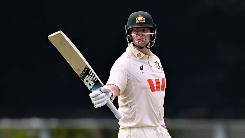 Australian batsman Steve Smith acknowledges the applause after scoring his fifty on the first day of the first cricket Test match between Australia and Bangladesh at Marrara Stadium in Darwin on August 13, 2026. (Photo by William WEST / AFP) / --IMAGE RESTRICTED TO EDITORIAL USE - STRICTLY NO COMMERCIAL USE--