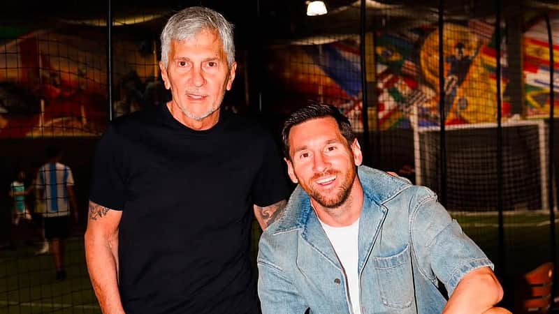 Lionel Messi with his father.