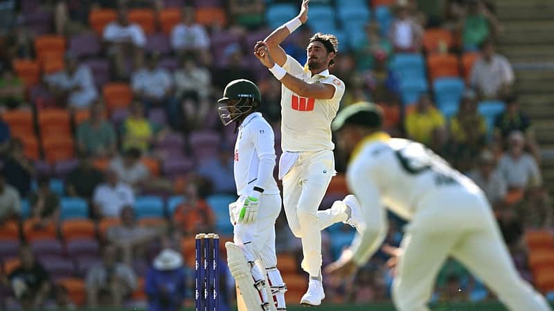 Australia's Mitchell Starc (C) sends down a delivery on the first day of the first cricket Test match between Australia and Bangladesh at Marrara Stadium in Darwin on August 13, 2026. (Photo by William WEST / AFP) / --IMAGE RESTRICTED TO EDITORIAL USE - STRICTLY NO COMMERCIAL USE--