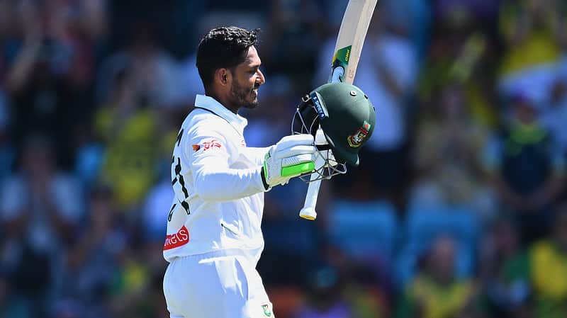 Tanzid Hasan Tamim of Bangladesh celebrates scoring a century against Australia during play on day two of the first cricket test in Darwin, Australia, Friday, Aug.14, 2026. (James Ross/AAPImage via AP)