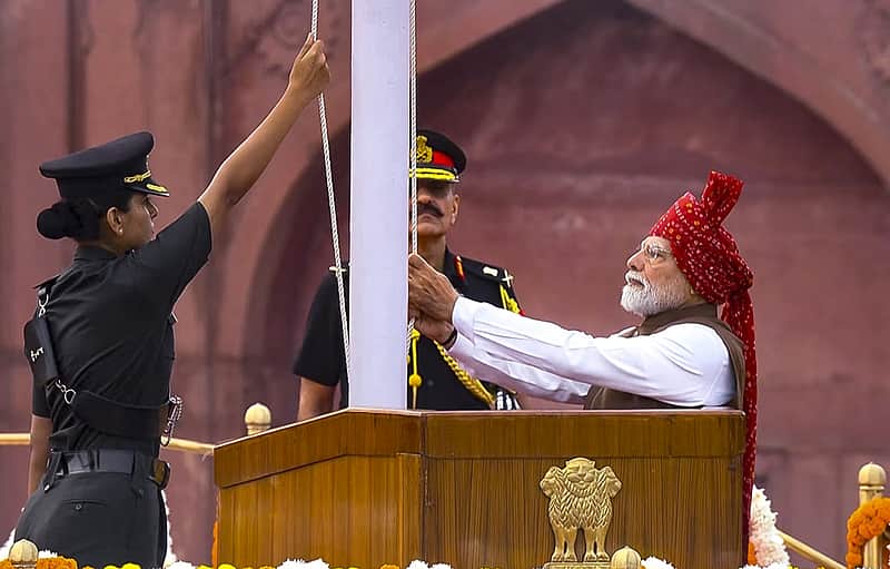 PM Narendra Modi hoists the national tri-colour flag during the 8oth Independence Day celebrations, at Red Fort in New Delhi.