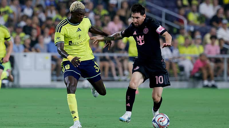 Inter Miami CF offense Lionel Messi (10) dribbles the ball as Nashville SC defense Andy Nájar (31) defends during the first half of an MLS soccer match Saturday, Aug. 15, 2026, in Nashville, Tenn. (AP Photo/Butch Dill)