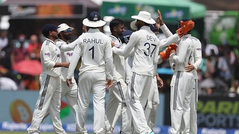 Indian team players rejoicing after taking a wicket.