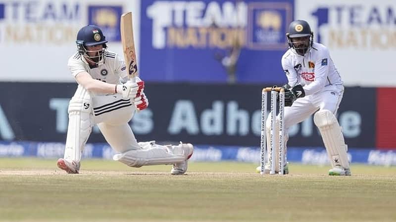 K.L. Rahul driving the ball to the boundary.