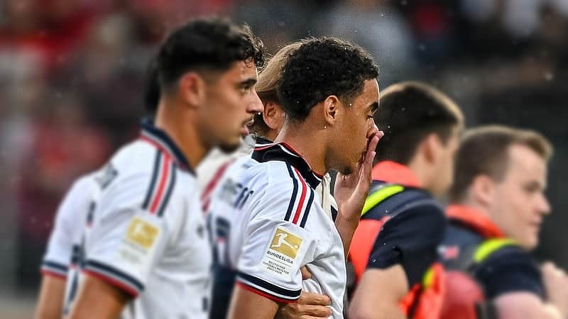 Bayern's Jamal Musiala, second left, leaves the field during a friendly soccer match between FC Heidenheim and FC Bayern Munich in Heidenheim, Germany, Tuesday, Aug. 18, 2026. (Harry Langer/DeFodi/dpa via AP)
