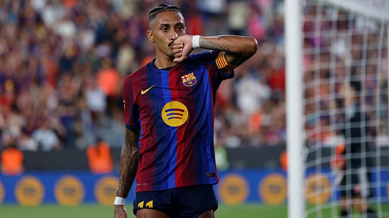 Barcelona's Raphinha celebrates after scoring his side's second goal during the Joan Gamper trophy soccer match between FC Barcelona and Al Ahly at the Camp Nou Stadium in Barcelona, Spain, Wednesday, Aug. 19, 2026. (AP Photo/Joan Monfort)