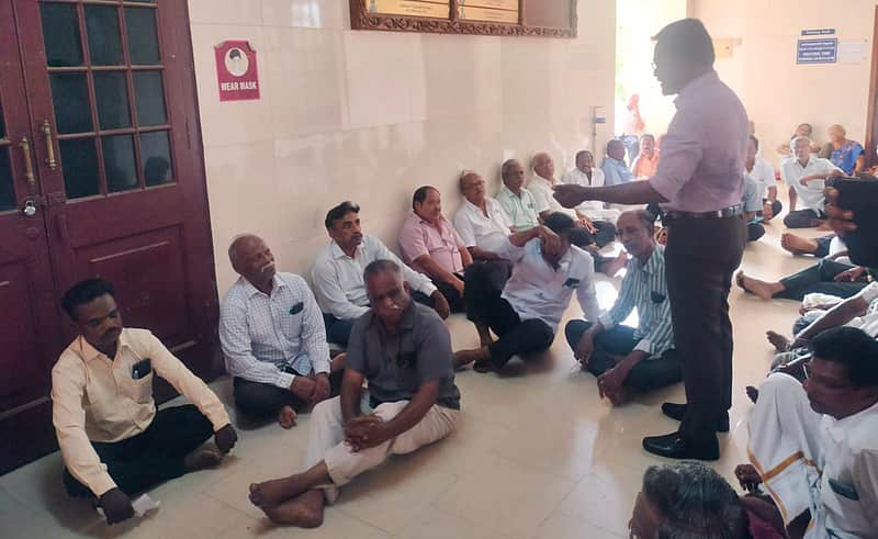 Professors and staff stage a siege protest at Annamalai University