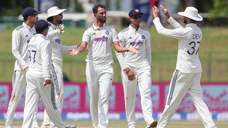Indian team players rejoicing after taking a wicket.