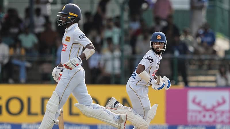 Sri Lanka's Keshara Nuwantha, left, and Sonal Dinusha run between the wickets during day three of the second cricket test match between Sri Lanka and India in Colombo, Sri Lanka, Tuesday, Aug. 25, 2026. (AP Photo/Eranga Jayawardena)