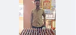 வெளி மாநில மதுப்புட்டிகள் பறிமுதல்: இளைஞா் கைது