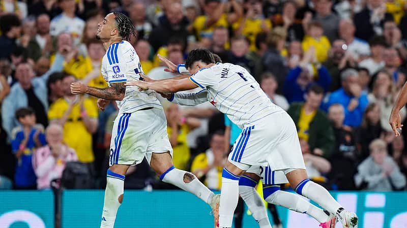 Leeds United's Noah Okafor, left, celebrates scoring their side's fourth goal during the English Premier League soccer match between Leeds United and Newcastle United in Leeds, England, Monday, Sept. 14, 2026. (Annabel Lee-Ellis/PA via AP)