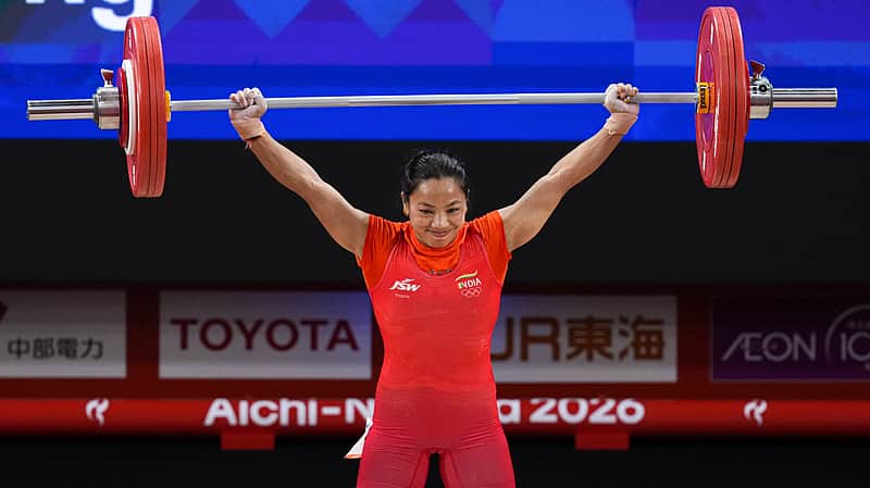 Nagoya: Indias Mirabai Chanu competes in the Womens 49kg Group A weightlifting final match during the 20th Asian Games, in Nagoya, Japan, Wednesday, Sept. 23, 2026. (PTI Photo/Arun Sharma)(PTI09_23_2026_000088A)