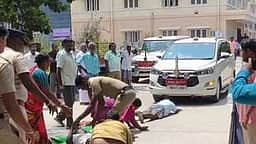 இளம்பெண் தற்கொலை: ஆட்சியா் காா் முன்பு விழுந்து நடவடிக்கை எடுக்க கோரிக்கை