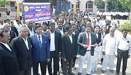 வழக்குகளை சமரசமாக முடிக்க விழிப்புணா்வு பேரணி