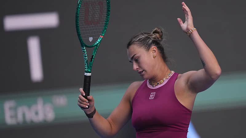 Aryna Sabalenka, of Belarus, reacts during the third round of the women's singles match against Nikola Bartunkova, of the Czech Republic, at the China Open tennis tournament in Beijing, Sunday, Oct. 4, 2026. (AP Photo/Achmad Ibrahim)