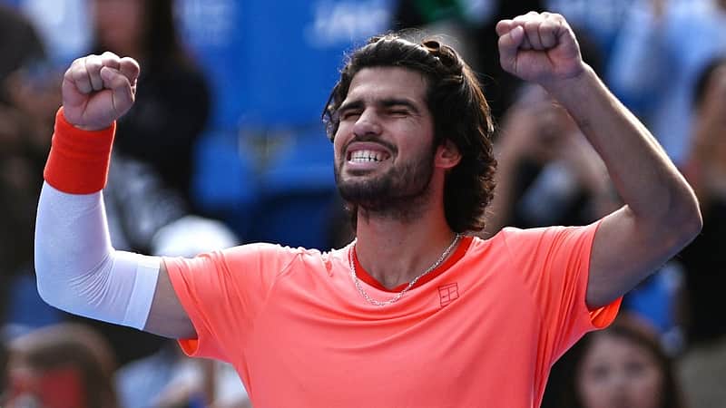 Spain's Carlos Alcaraz celebrates beating Italy's Matteo Arnaldi in their men's singles tennis match at the ATP Tour Japan Open Tennis Championships at the Ariake Tennis Forest Park in Tokyo on October 3, 2026. (Photo by Rie KIKUCHI / AFP)