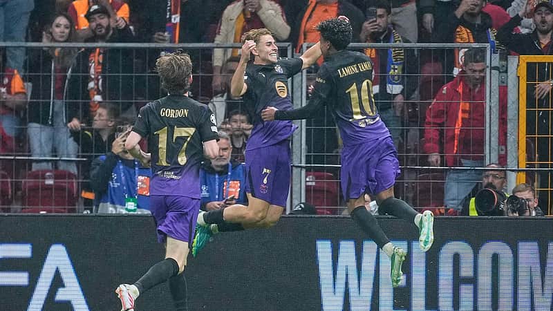 Barcelona's Fermin Lopez, left, celebrates with teammate Lamine Yamal after scoring their side's second goal during the Champions League opening phase soccer match between Galatasaray and Barcelona in Istanbul, Turkey, Tuesday, Oct. 13, 2026. (AP Photo/Khalil Hamra)