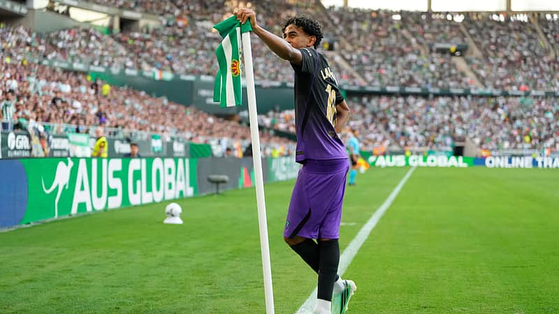 Barcelona's Lamine Yamal celebrates after scoring his side's opening goal during the Spanish La Liga soccer match between Real Betis and Barcelona in Seville, Spain, Saturday, Oct. 17, 2026. (AP Photo/Jose Breton)