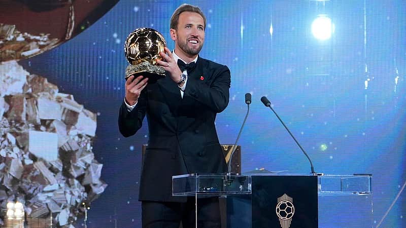 England's soccer player Harry Kane holds the player of the year trophy during the Ballon d'Or ceremony at the London Palladium Theatre in London, England, Monday, Oct. 26, 2026 . (AP Photo/Kin Cheung)
