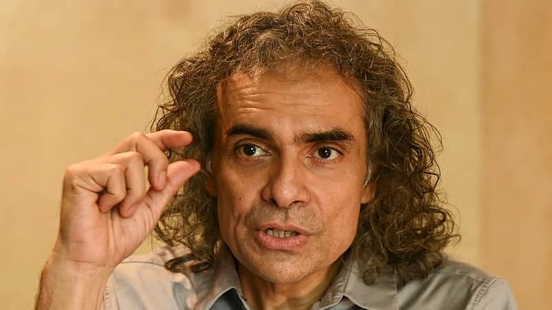 This photograph taken on May 27, 2026 shows Bollywood filmmaker Imtiaz Ali speaking about his upcoming film 'Main Vaapas Aaunga' during an interview with AFP in Mumbai