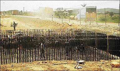 மந்தகிதியில் நான்கு வழிப்பாதை விரிவாக்கப் பணிகள்