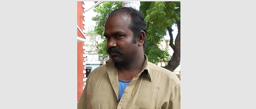 பஸ் நிலையத்தில் டிரைவரை தாக்கிய இரு சக்கர வாகன ஓட்டி கைது