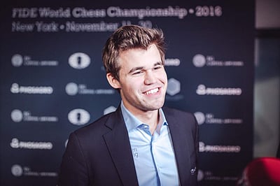 கார்ல்சனுடன் மோதப் போகிற வீரர் யார்?: உலக செஸ் போட்டி ஒத்திவைப்பு