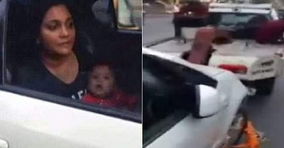 பின்னிருக்கையில் குழந்தையுடன் பெண்: கண்டுகொள்ளாமல் காரை இழுத்துச் சென்ற போலீஸ்! (விடியோ இணைப்பு)