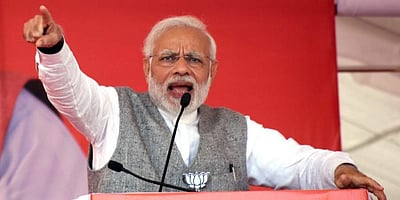 விவசாயக் கடன் தள்ளுபடி வாக்குறுதியின் மூலம் மக்களை முட்டாளாக்கி வரும் காங்கிரஸ்: பிரதமர் மோடி  