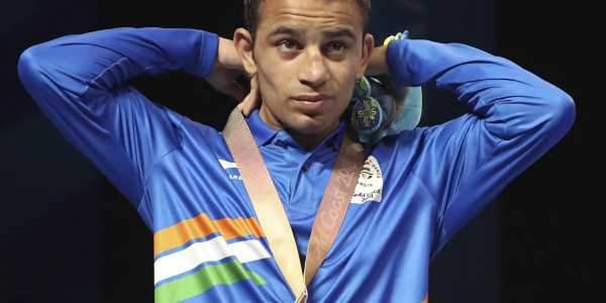 ஆசியப் போட்டி: அரையிறுதிக்குள் நுழைந்து பதக்கத்தை உறுதி செய்த இந்தியக் குத்துச்சண்டை வீரர்