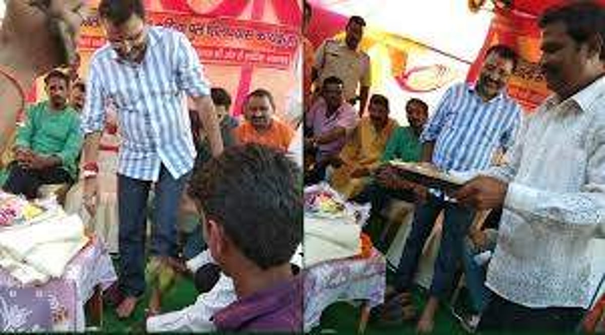 பாஜக எம்.பியின் காலைக் கழுவி அந்த நீரைக் குடித்த தொண்டர்: அதிர்ச்சி சம்பவம் (விடியோ)