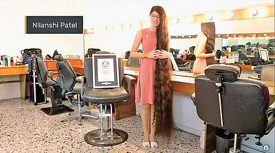 இவ்ளோ பெரிய கூந்தலா? வியக்க வைத்த கின்னஸ் சாதனைப் பெண்!