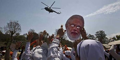 மோடி ஹெலிகாப்டரை சோதனை செய்த தேர்தல் அதிகாரி சஸ்பெண்ட்: தேர்தல் ஆணையம் கடும் நடவடிக்கை