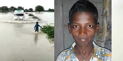 வெள்ளத்தின் நடுவே சிக்கிய ஆம்புலன்ஸ்; வழிகாட்டிய துணிச்சல்மிக்க சிறுவன்; வைரலாகும் வீடியோ!