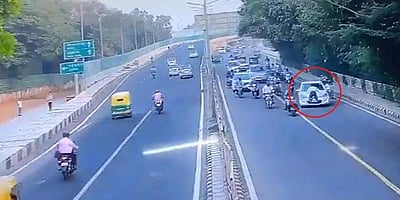 நிறுத்த முயன்ற போக்குவரத்துக் காவலரை காரில் தூக்கிச் சென்ற அவலம்