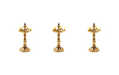 குத்துவிளக்கை தரையில் வைத்து ஏற்றலாமா?