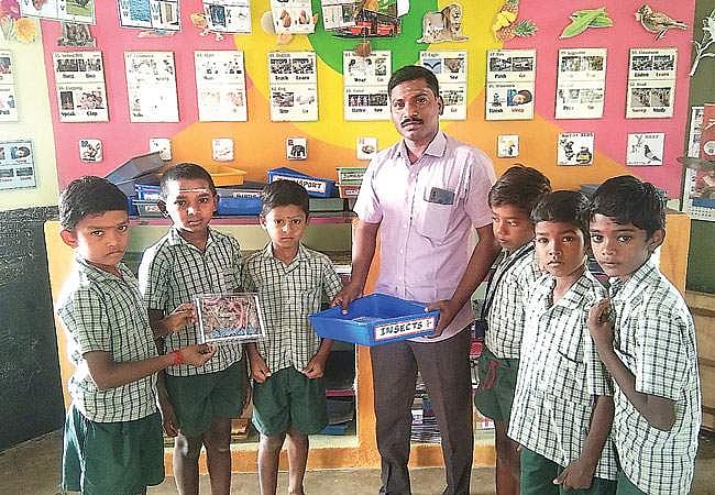 வகுப்பறைச் சுவரில் வண்ண ஓவியங்கள்!