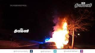 தீ பற்றி எரியும் காரில் சிக்கிக் கொண்டவரை சாமர்த்தியமாக மீட்ட ஜார்ஜியா காவல்துறையினர்