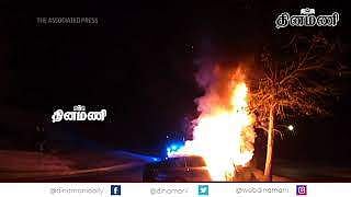 தீ பற்றி எரியும் காரில் சிக்கிக் கொண்டவரை சாமர்த்தியமாக மீட்ட ஜார்ஜியா காவல்துறையினர்