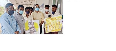 தென்காசியில் வாக்காளா் விழிப்புணா்வு ஓவியம்