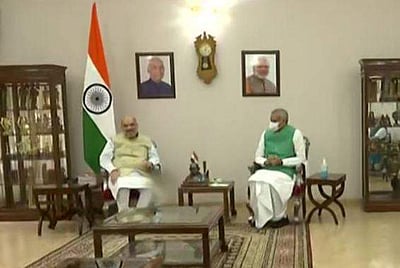 குஜராத் ஆளுநருடன் அமித் ஷா சந்திப்பு