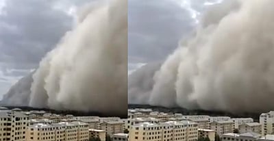 சீன நகரை சூழ்ந்த புழுதிப்புயல்: அதிர வைக்கும் காட்சிகள்