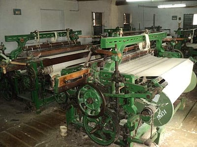 விசைத்தறி கூலி உயர்வு பேச்சுவார்த்தை: ஜவுளி உற்பத்தியாளர்கள் வராததால் கூட்டம் ஒத்திவைப்பு