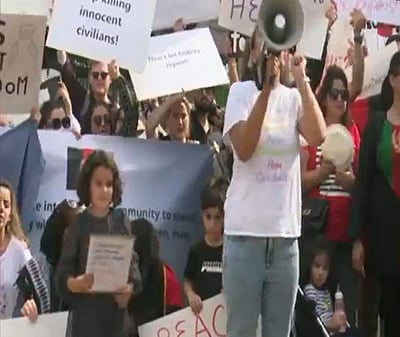 வெள்ளை மாளிகைக்கு வெளியே ஆப்கன் நாட்டினர் போராட்டம்