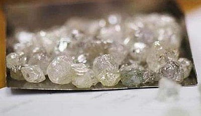 குஜராத்தில் வருமான வரித்துறை அதிரடி; முன்னணி வைர நிறுவனத்திற்கு சொந்தமான 23 இடங்களில் சோதனை