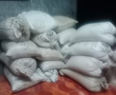 திண்டுக்கல்லில் 1 டன் ரேஷன் அரிசி பறிமுதல்: கடத்தலில் ஈடுபட்ட இளைஞா் தப்பியோட்டம்