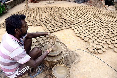 அல்லல்கள் அகற்றும் அகல் விளக்கு - புகைப்படங்கள்