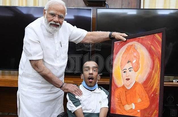 'மறக்க முடியாத தருணம்': மாற்றுத்திறனாளி ஓவியருடன் மோடியின் சந்திப்பு அனுபவம்