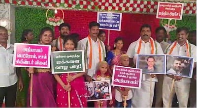 புதுவை காங். பிரமுகர் இல்ல விழா: விலை உயர்வுக்கு எதிராக பதாகை ஏந்தி கண்டனம்